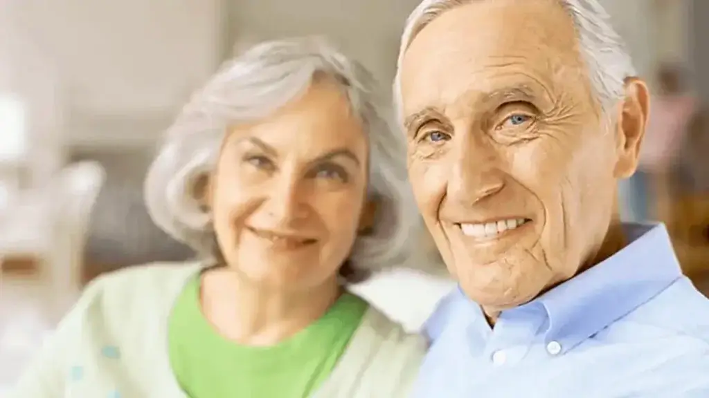 A retired man and woman at their assisted living facility.